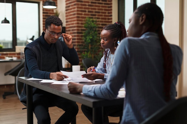 Black African professionals in office meeting